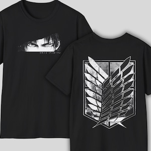 May include: Black t-shirts featuring anime-style graphics. One shirt displays a close-up of a character's eyes with Japanese text. The other shirt has a white and gray emblem of wings on the back.