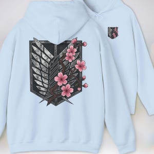 Anime Hoodie - Attack on Titan, Wings of Freedom with Sakura Blossom, Manga Anime Gift, Shingeki no Kyojin, Light Blue Hoodie, kawaii clothing, kawaii hoodie, gojo, gojo hoodie, anime decor, streetwear style, nerdy, jjk clothes, hoodie, anime, jujutsu kaisen gifts, jujustu kaisen, jujutsu kaisen geto