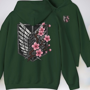 Buy a Gift for any Manga or Anime Fan – our Attack on Titan “Wings of Freedom” Hoodie with Sakura Blossom, Manga Anime Gift, Shingeki no Kyojin, Green Hoodie, kawaii clothing, kawaii hoodie, gojo, gojo hoodie, anime decor, streetwear style, nerdy, jjk clothes, hoodie, anime, jujutsu kaisen gifts, jujustu kaisen, jujutsu kaisen geto, AOT