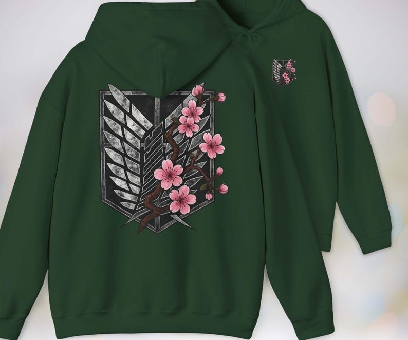 Buy a Gift for any Manga or Anime Fan – our Attack on Titan “Wings of Freedom” Hoodie with Sakura Blossom, Manga Anime Gift, Shingeki no Kyojin, Green Hoodie, kawaii clothing, kawaii hoodie, gojo, gojo hoodie, anime decor, streetwear style, nerdy, jjk clothes, hoodie, anime, jujutsu kaisen gifts, jujustu kaisen, jujutsu kaisen geto, AOT