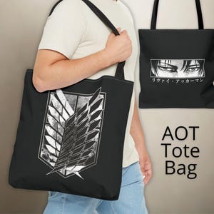 May include: Black tote bag featuring a white and gray emblem with wings and the text "AOT Tote Bag." Another bag displays a close-up of eyes and Japanese text. The bags have black straps.
