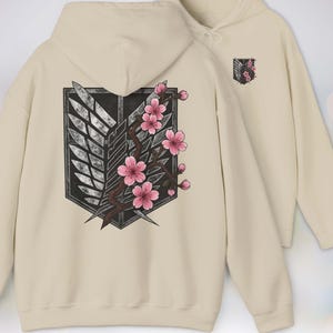 Anime Hoodie - Attack on Titan, Wings of Freedom with Sakura Blossom, Manga Anime Gift, Shingeki no Kyojin, Beige Hoodie, kawaii clothing, kawaii hoodie, gojo, gojo hoodie, anime decor, streetwear style, nerdy, jjk clothes, hoodie, anime, jujutsu kaisen gifts, jujustu kaisen, jujutsu kaisen geto