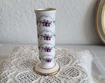 Miniature porcelain bud vase with floral print