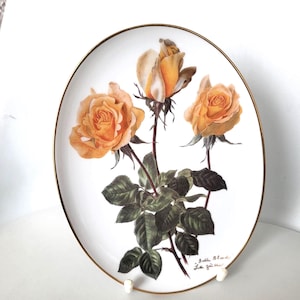 Porcelanowy talerz ścienny Bradex Vintage z motywem pomarańczowych róż – projekt podpisany przez artystkę Lotte Gunthart-Maag Bradford Exchange