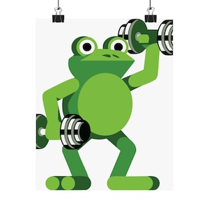 Könnte beinhalten: Illustration einer grünen Cartoon-Frosches, der Gewichte hebt. Der Frosch ist in einem stilisierten, geometrischen Design dargestellt, mit großen Augen und einem runden Bauch. Die Gewichte sind schwarz und weiß. Das Bild ist mit Büroklammern an einem weißen Hintergrund befestigt.