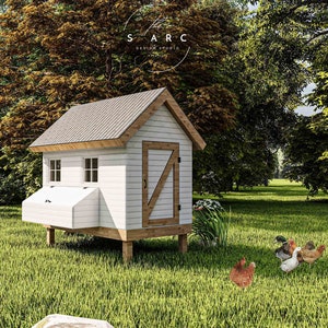 May include: A white chicken coop with a gray roof, a wooden door, and two windows. The coop is on a grassy lawn with three chickens in front of it. The text "SARC Design Studio" is visible in the upper right corner of the image.