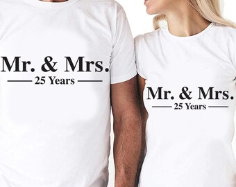 May include: White t-shirts with black text that reads "Mr. & Mrs. - 25 Years" on each shirt.