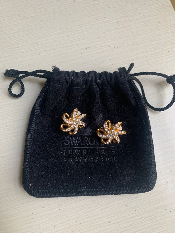 Swarovski floral pinwheel clip on earrings - image 1