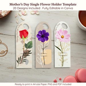 May include: Three Mother's Day single flower holder templates with a red rose, purple flower, and pink flower. Each holder has a floral design and the text "Happy Mother's Day". The image includes a cup of tea and macarons.