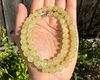 8.1mm Certified Natural Premium Quality Icy Translucent Ruoqiang Huang Kou Yellow Hetian Nephrite Jade  Bead Necklace 若羌黃口和田玉颈链，高品質起螢光