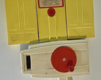 Visor de películas Fisher Price de 1973 con tres cartuchos. Funciona. *Leer detalles* Fotos