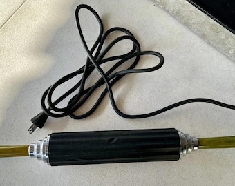 Rodillo de masaje térmico vintage, de baquelita, años 30, "Quack Medicine"