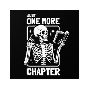 May include: Black and white illustration of a skeleton reading a book with the text "Just One More Chapter".