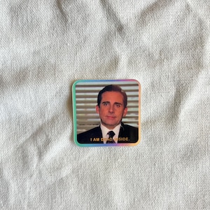 May include: Square sticker featuring a color image of a man in a suit and tie. The sticker has a holographic border and the text "I AM DEAD INSIDE" in a sans-serif font.
