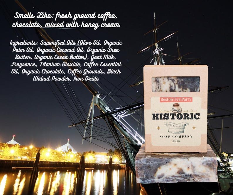 May include: A bar of soap in a box with the text "Boston Tea Party" and "Historic Soap Company." The soap is brown and white, with a dark background and a ship in the background. The text says it smells like coffee, chocolate, and honey cream.
