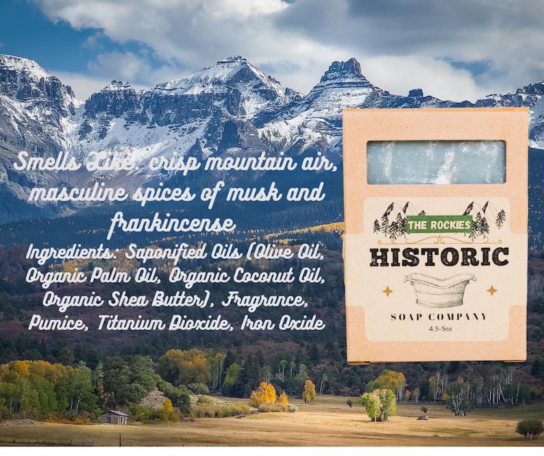 May include: A bar of soap in a cardboard box with the text "Historic Soap Company" and "The Rockies". The soap is light blue and the box has a mountain landscape background. The text on the box says the soap smells like crisp mountain air, musk, and frankincense.