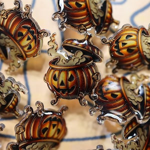Pumpkin Cauldron UV Resin Pin – Spooky Halloween Jack-O’-Lantern Witch Pot Accessory for Fall Fashion, Gifts & Gothic Decor