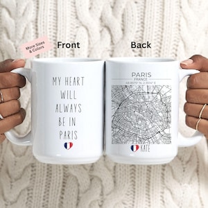 May include: White ceramic mug with the text "MY HEART WILL ALWAYS BE IN PARIS" on the front and a map of Paris on the back. The mug also features the text "PARIS FRANCE" and the coordinates 48.8575° N, 2.3514° E.