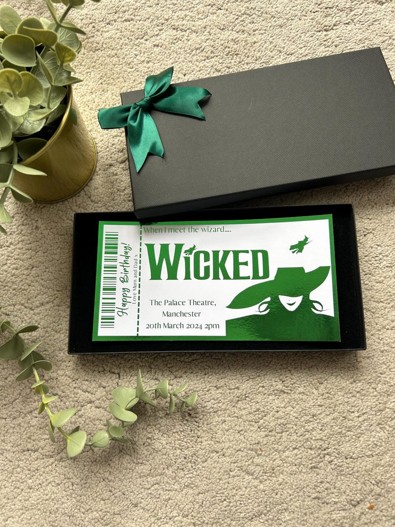 May include: A green and black ticket for the musical Wicked at the Palace Theatre in Manchester on March 20, 2024 at 2pm. The ticket has the text "When I meet the wizard..." and a silhouette of the Wicked Witch of the West.