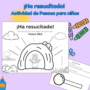 Op de afbeelding: Een zwart-wit kleurplaat met Pasen als thema met de tekst "¡Ha resucitado!" en "Actividad de Pascua para niños". De afbeelding toont Jezus die uit een graf komt, met wolken en lichtstralen. Inclusief kleurpotloden, een schaar en een vergrootglas.