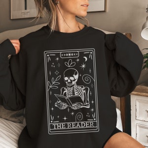 The Reader Skeleton Tarot Card Crewneck Sweatshirt, Halloween Sweatshirt Celestial Whimsigoth Tarot Card Sweatshirt Reading Booktok Bookworm