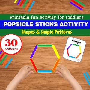 May include: A child's hands are holding popsicle sticks to create a hexagon shape. A red circle with the number 30 and the word "patterns" is in the top left corner. A card with the words "I can make a Hexagon" is in the top right corner. The background is a wooden surface.