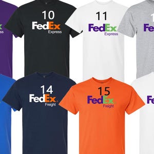 May include: A collection of eight t-shirts in various colors, each featuring the FedEx logo and a number. The shirts include purple, black, white, gray, blue, navy, orange, and white. The logos vary between "Express" and "Freight".