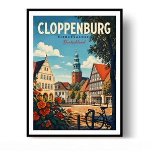 May include: A framed travel poster featuring the town of Cloppenburg, Niedersachsen, Deutschland. The illustration depicts a town square with half-timbered buildings, a church tower, a bicycle, and orange flowers under a blue sky with clouds.