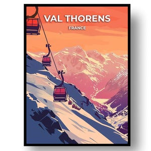 May include: A framed art print showing a stylized illustration of Val Thorens, France. The artwork depicts a ski resort with cable cars ascending snow-covered mountains under a vibrant orange and pink sky. The text "VAL THORENS FRANCE" is at the top.