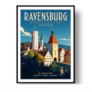 May include: A framed travel poster of Ravensburg, Deutschland, featuring a blue sky, white clouds, and historic stone towers with red roofs. The text reads RAVENSBURG DEUTSCHLAND OBERSCHWABEN and DIE STADT DER TÜRME Geschichte. Vielfalt. Lebenskultur.