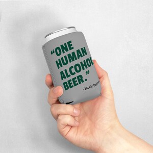 This is a medium gray foam can coozie/koozie that says, "One Human Alcohol Beer" in a dark green font.  The quote is attributed to "Jackie Daytona".