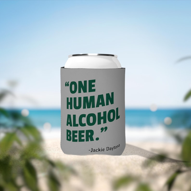 This is a medium gray foam can coozie/koozie that says, "One Human Alcohol Beer" in a dark green font.  The quote is attributed to "Jackie Daytona".