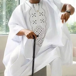 African men clothing, African men Agbada , Agbada outfits, men kaftan , white agbada, the real men Agbada, engagement outfits, wedding suit