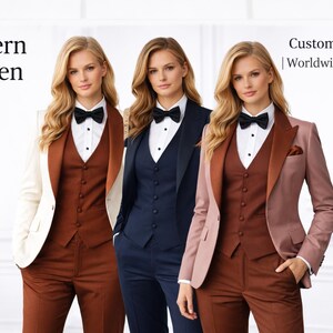 May include: Three women's suits in different colors: cream, navy blue, and dusty rose. Each suit includes a blazer, vest, and trousers. The suits are paired with a white dress shirt and a black bow tie. The text "Modern Women Suits" is visible.