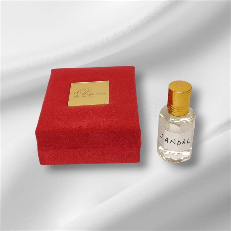 Artisan-made sandal perfume oil, creamy woody aroma, alcohol-free formulation