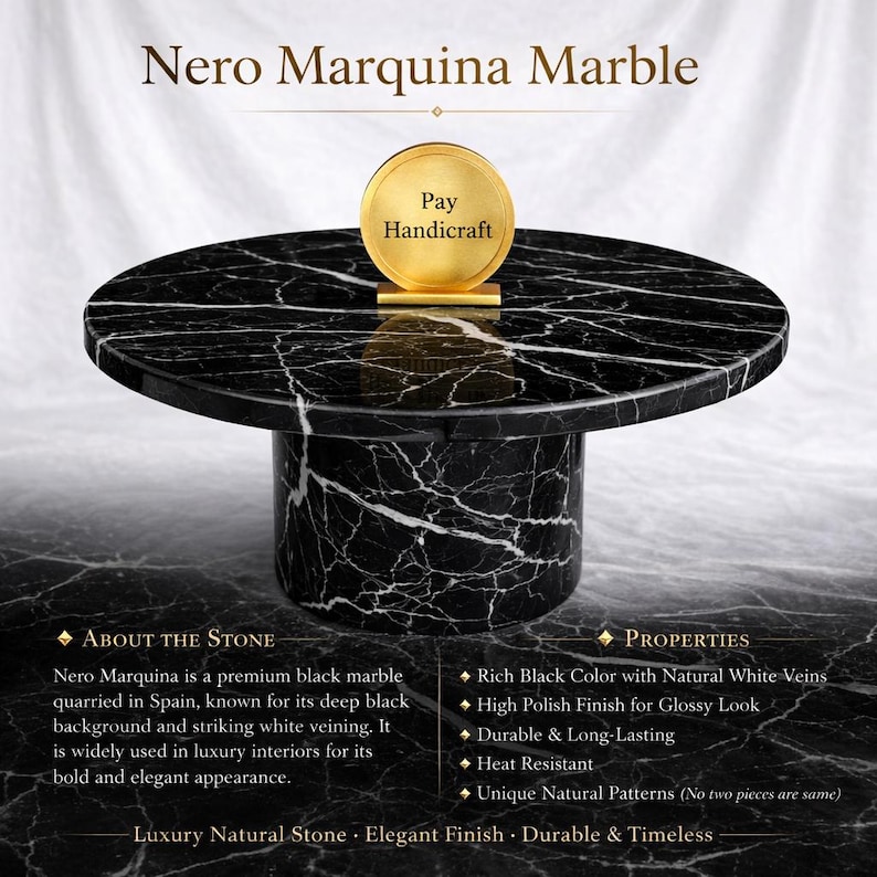 May include: A black Nero Marquina marble table with white veining. The round tabletop sits on a cylindrical base. The text "Nero Marquina Marble" is at the top. A gold-colored disc with "Pay Handicraft" is on the table.