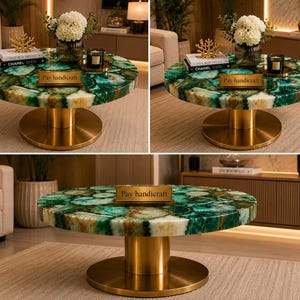 May include: A round coffee table featuring a green and white agate stone top with a polished finish. The table is supported by a cylindrical gold metal base and a circular floor plate. A small rectangular sign reads Pay handicraft.