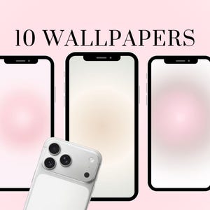 Peut inclure: L'image présente trois smartphones avec des fonds d'écran dégradés roses et beiges. Un smartphone blanc avec un appareil photo à trois objectifs est au premier plan. Le texte "10 WALLPAPERS" est en haut.