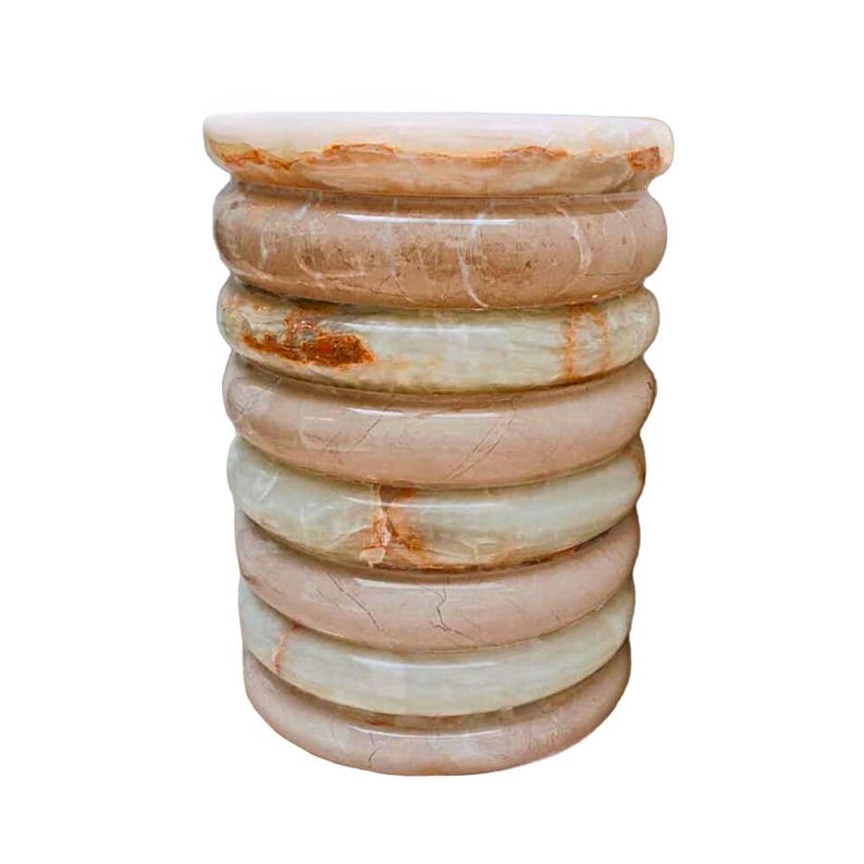 Unique small accent table shaped like tyres, combining beige marble and white onyx