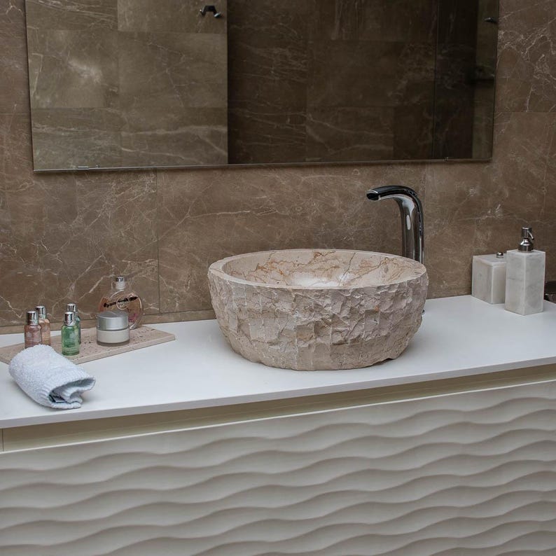 Farmhouse sink made of cream marble, designed for countertop vanity units in both contemporary and classic styles