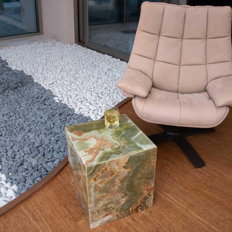 Stylish end table made of green onyx, featuring a cube structure