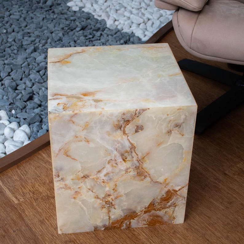 Natural white onyx stone table with square cube design for contemporary interior styling.