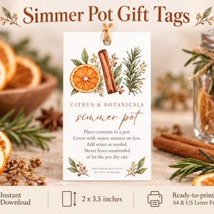 May include: A rectangular white gift tag featuring a watercolor illustration of a dried orange slice, cinnamon sticks, and rosemary. The text reads Simmer Pot Gift Tags, Citrus & Botanicals, simmer pot, and instructions for use. The tag measures 2 x 3.5 inches.