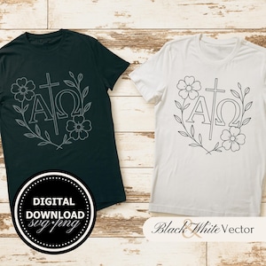 Könnte beinhalten: Schwarzweißes Vektorgrafikdesign eines Kreuzes mit den Buchstaben Alpha und Omega auf beiden Seiten, umgeben von einem Kranz aus Blättern und Blumen. Das Design ist auf zwei T-Shirts abgebildet, einem schwarzen und einem weißen.