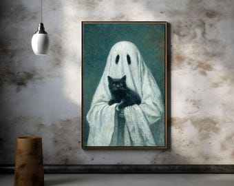 Op de afbeelding: Een ingelijst schilderij toont een spookfiguur in een wit laken, met een zwarte kat in zijn armen. Het kunstwerk heeft een vintage esthetiek met een teal achtergrond. De geest heeft twee ovale ooggaten. De kat is klein en pluizig.