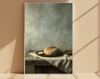 May include: A rustic still life featuring a round loaf of bread on a wooden table. The bread sits on a dark plate with a slice beside it, atop a linen cloth. The background is a muted, textured wall.