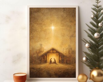 May include: Framed artwork depicting a nativity scene with a bright star overhead. The painting features a warm, golden color palette, with a stable and figures in silhouette. A small Christmas tree with ornaments and a gold bauble are on the right.