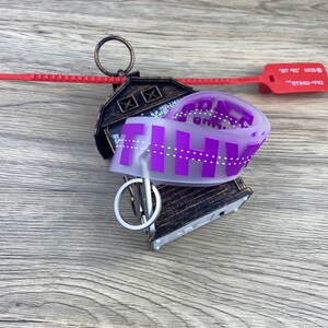 Off-White Keychain with Zip Tie Tag — COP THAT