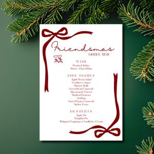 May include: A Friendsmas dinner menu on a white card with a dark red ribbon design. The menu includes Roasted Turkey, Honey-Glazed Ham, Apple Pecan Salad, Cranberry Sauce, and desserts like Apple Pie and Pumpkin Pie. The card is set against a dark green background with pine branches.