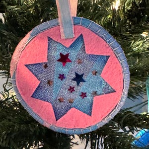 Pink and blue multimedia ornament, sequence, 8 pointed star